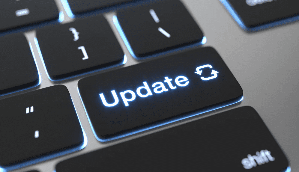 Update button on a laptop keyboard to represent software modernisation