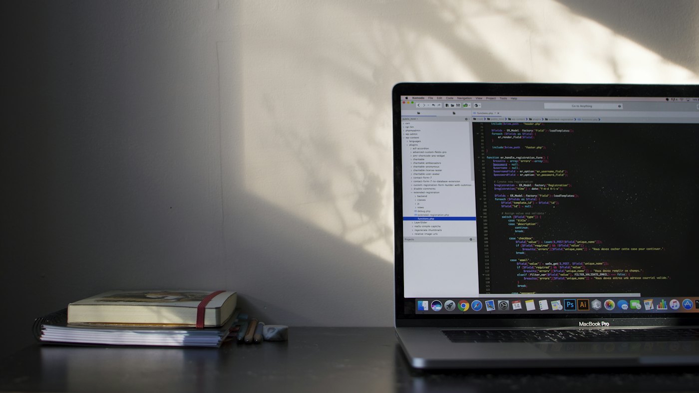 Developer rewriting code on a laptop