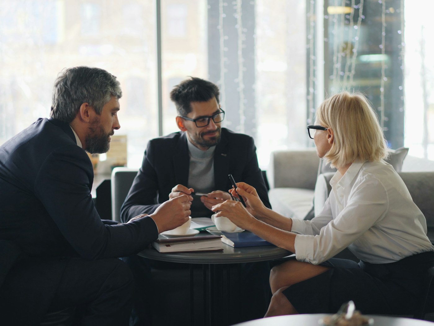 Insurance advisors meeting with a client