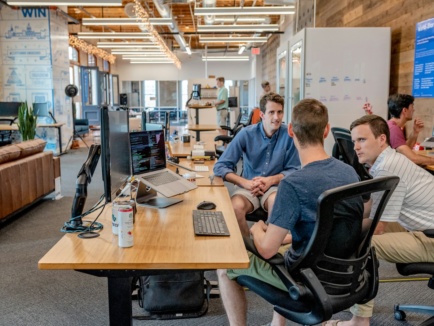 HR and operations team working together in a modern office